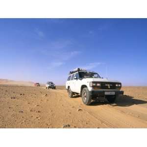 Jeeps Driving Through Desert, Erg Murzuq, Sahara Desert, Fezzan, Libya 