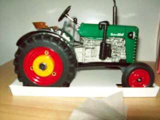 This ad is for a KOVAP 125, Zetor 25A tin windup toy tractor, still 