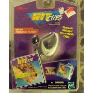 com Hit Clips Micro Personal Music Player w/Madonna ray of light clip 