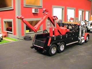 THIS IS A IS A CUSTOM BUILT TRUCK WITH A WRECKER BODY FOR THOSE HEAVY 