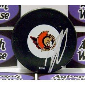 Dany Heatley Autographed Hockey Puck (Ottawa Senators)  