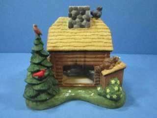   CABIN WITH BIRDS RACCOONS A CANOE FISHING EQUIPMENT AND OTHER ANIMALS