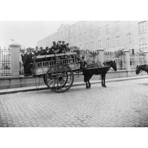 early 1900s photo Immigrants being transported on horse drawn wagon 