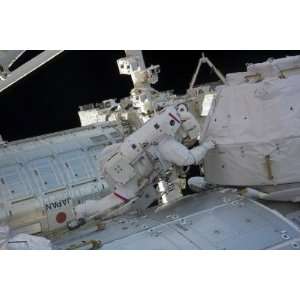  Astronaut Participates in a Session of Extravehicular 