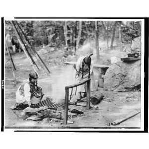  Two Girl Scouts building a fire in camp,1919