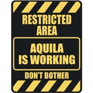   RESTRICTED AREA AQUILA IS WORKING  PARKING SIGN