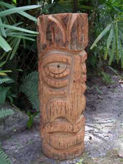 Traditional Hawaiian Polynesian style tiki statue carvings are hand 