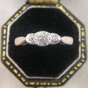   wonderful deco trilogy ring which looks excellent when worn