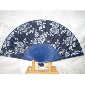  Hand fan in blue background with flowers 