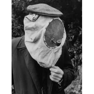  Beekeeper, Gerrit Norsselman using the Smoke to Help Keep 