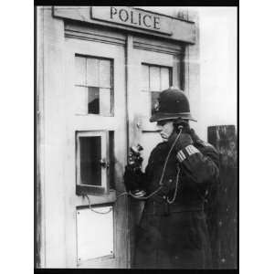  A Police Constable Using the Telephone at a Police Box 