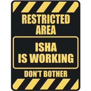   RESTRICTED AREA ISHA IS WORKING  PARKING SIGN