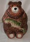   Bear Cookie Jar He is holding a fish has a basket of them on his back