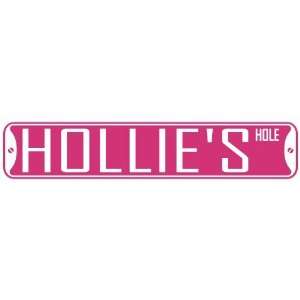   HOLLIE HOLE  STREET SIGN