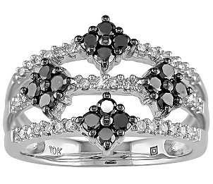 An ornate and unique black diamond ring with white diamonds and a 