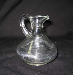 vintage small clear glass pitcher or cruet 4 tall  
