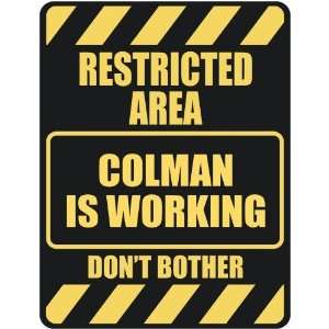   RESTRICTED AREA COLMAN IS WORKING  PARKING SIGN