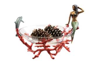 This aluminum red coral decorative bowl is accented with a mermaid and 