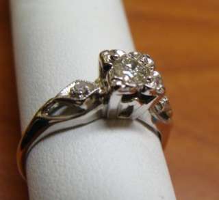   14K WHITE GOLD DIAMOND ENGAGEMENT RING ,25 CARATS. PLUS ACCENTS  