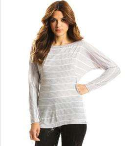 Dolman sleeves and delicate seam detailing add intrigue to this casual 
