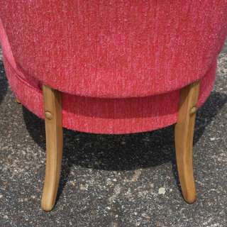   splayed legs button tufted back amaranth color reddish rose upholstery