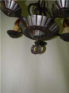 are pleased to be offering this magnificent Art Deco metal chandelier 