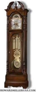 The elegant swan neck pediment of this fine grandfather clock 