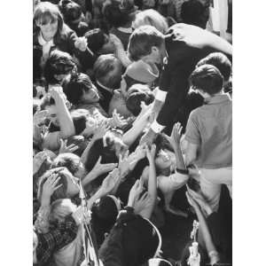 Senator Robert F. Kennedy Mobbed by Youthful Admirers During Campaign 