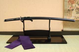   Katana collection are NOT RAZOR EDGE. The sword stand is not included