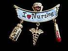 LOVE NURSING PIN WITH CHARMS FOR AN RN OR NURSE GRAD